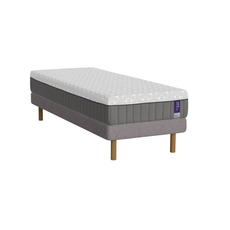 Harmaa Heaven By Unico Fusion -runkopatjapaketti 90 x 200 cm. Pakettiin kuuluu tukeva Suomessa valmistettu Lounge-vuoderunko, 90 x 200 cm Fusion Nano Cool™ memory foam patja sekä pyöreät tammen väriset jalat.