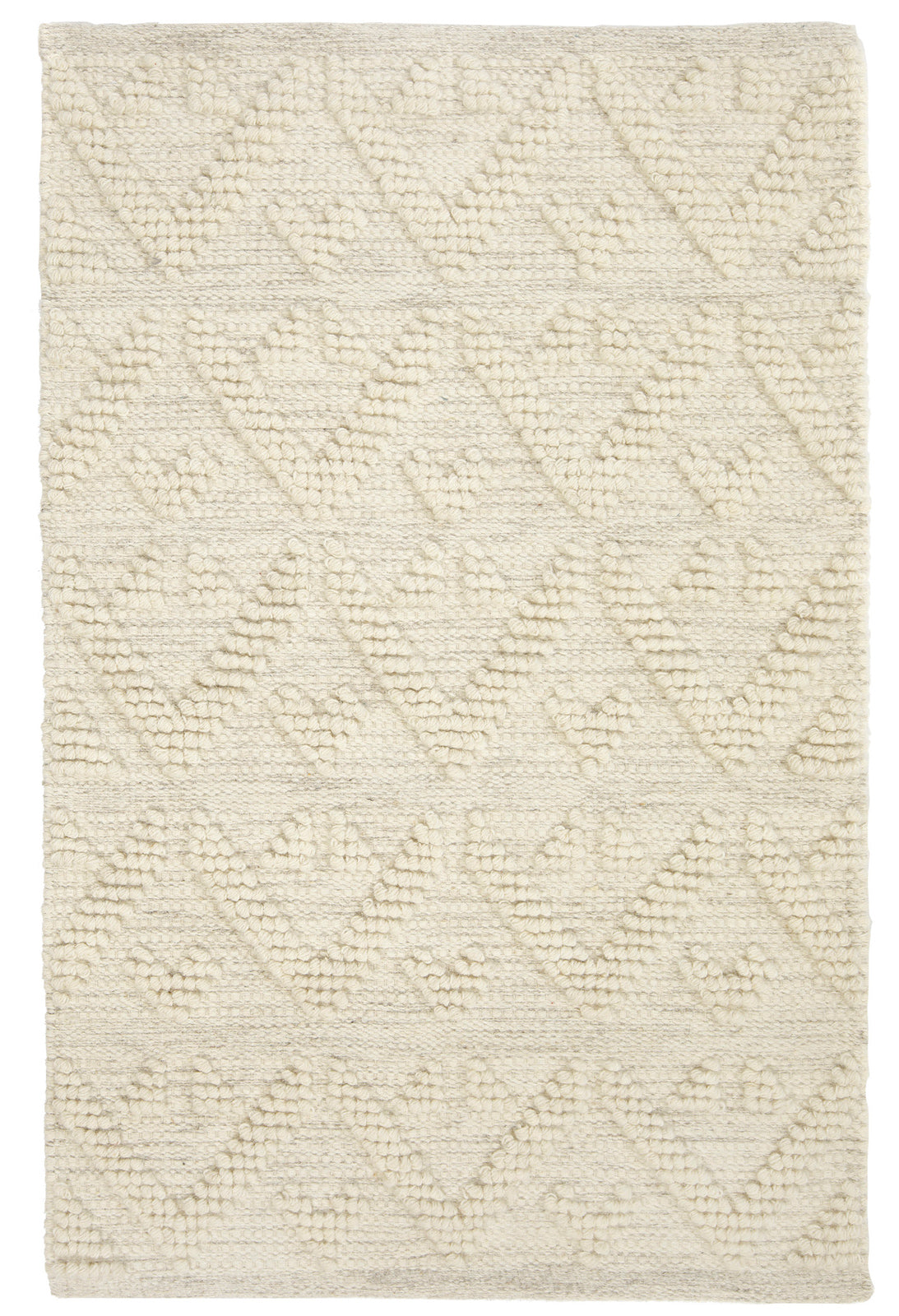 Käsinkudottu Helmi-villamatto luonnonvalkoisena.