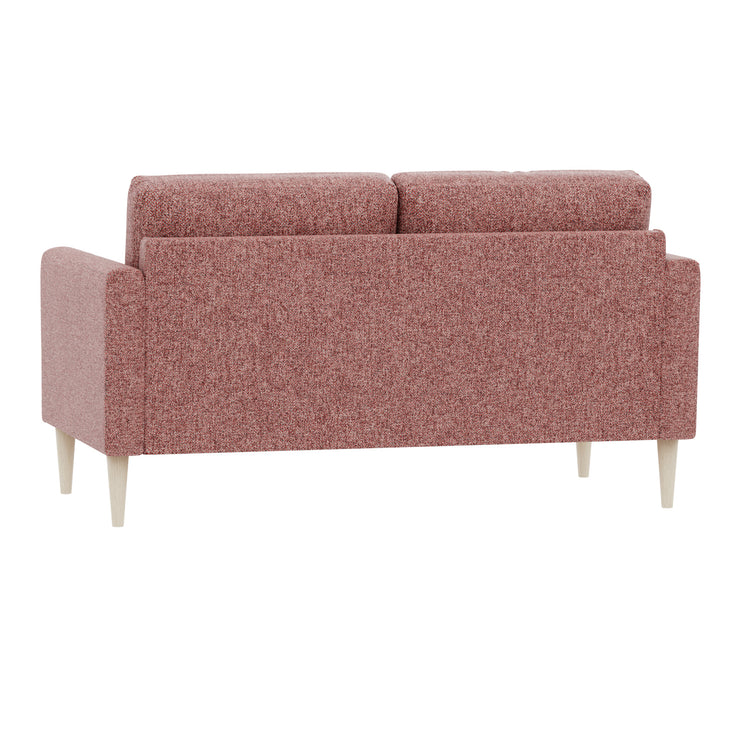 Ilona 2-istuttava sohva roosan värisellä Altamura 113 -kankaalla ja luonnonvärisillä 18 cm korkeilla pyöreäkartiojaloilla.  Kuvan sohvassa on 10 cm leveät KN10-käsinojat. Ilona-sohva on kauttaaltaan huolellisesti viimeistelty.