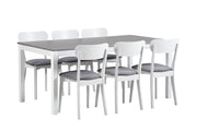 Harmaakantinen Kaisla-pöytä ja Laine-tuolit harmaalla istuinverhoilulla.