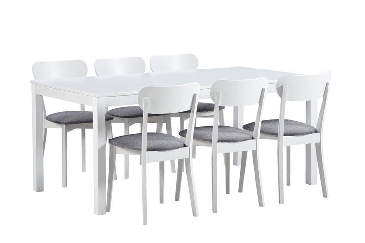 Valkoinen Kaisla-pöytä ja Laine-tuolit harmaalla istuinverhoilulla.