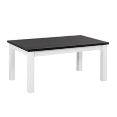 Valkoinen Kivi-sohvapöytä mustalla kansilevyllä.