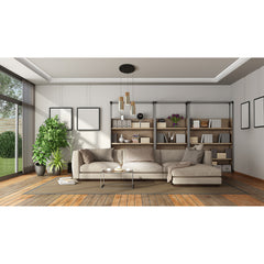 Log on Design by Grönlundin kattovalaisin, jota on saatavana kolmea eri kokoa. Kuvassa on pienimmät Ø 10 cm harjatun messingin väriset Log-valaisimet useamman valaisimen kokonaisuutena sohvan päällä.