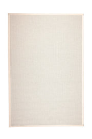 Eleganssi valkoinen Lyyra2-puuvillapaperinarumatto  valkoisella paperinarulla.
