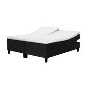 Jensen Nova Max Aqtive II -moottorisängyn musta verhoiluväri ja nelikulmaiset 14 cm korkeat tammijalat. Sleep 1 -sijauspatjat ja jalat sisältyvät hintaan.