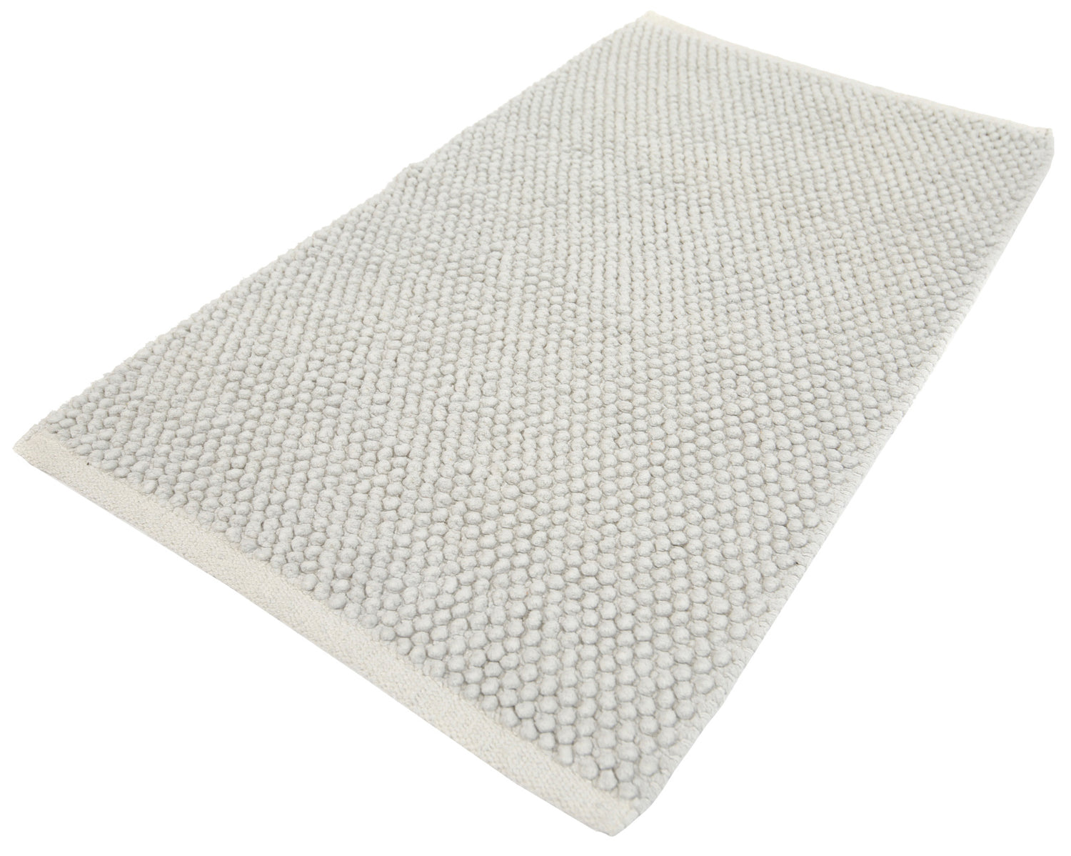 Pehmeä Olivia-matto vaaleanharmaana. Puuvillamatossa on pampulapinta ja liukumaton pohja.