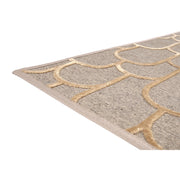 Paanu-matossa laadukkaaseen, kudottuun villapohjaan on yhdistetty pehmeä, silkinhohtoinen viskoosinukka. Kuvassa kullan värinen matto.