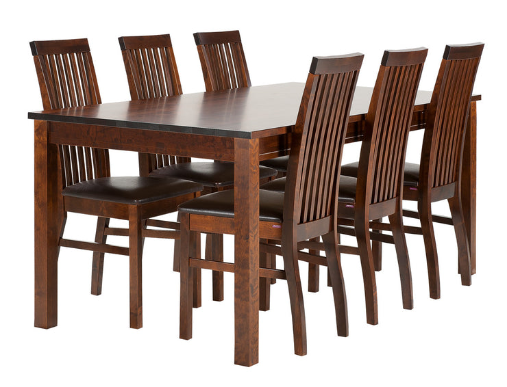 Kuvassa on tumman pähkinänvärinen Petra-pöytä yhdistettynä Eco Pull Up -keinonahkaverhoiltujen Petra-tuolien kanssa ruokailuryhmäksi.
