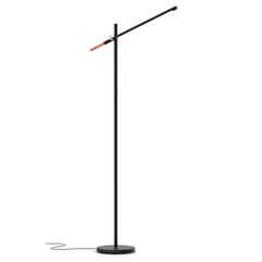 Musta Piano-lattiavalaisin kuparin värisellä yksityiskohdalla.