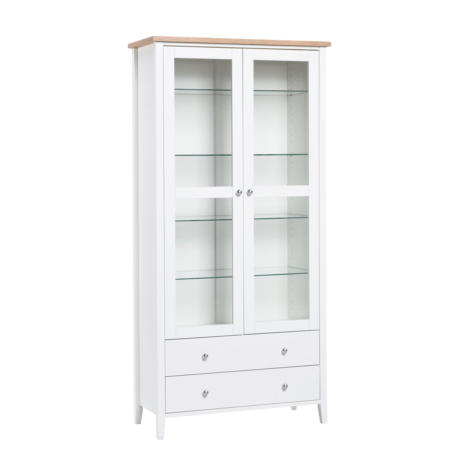 Valkoinen Saara-sarjan vitriini tammenvärisellä kansilevyllä ja lasihyllyillä. Monikäyttöisessä vitriinissä on sekä lasikaappi että laatikkotilaa.