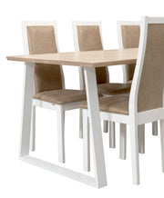 Swing-sarjan ruokailuryhmän pöytä on 190 x 90 cm kokoisella valkovahatulla kannella ja valkoisilla metallisilla viistejaloilla. Valkoisissa Pohjola-tuoleissa on vaaleanruskea istuimen ja selkänojan nahkaverhoilu.