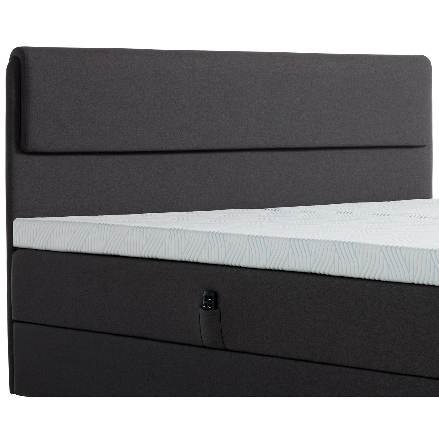 Kuvassa on 160 - 180 cm TEMPUR NORTH säätösänky grafiitinvärisellä Graphite-kangasverhoilulla ja TEMPUR Pro SmartCool -sijauspatjoilla. Sängyn sivussa on kätevä tasku kaukosäätimelle. Kuvan sängynpääty myydään erikseen.