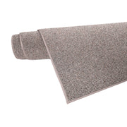 Harmaa Tweed-matto rullalla.