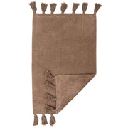 Vilma-kylpyhuoneen maton beige väri.