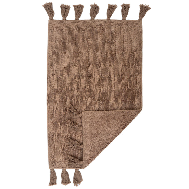 Vilma-kylpyhuoneen maton beige väri.
