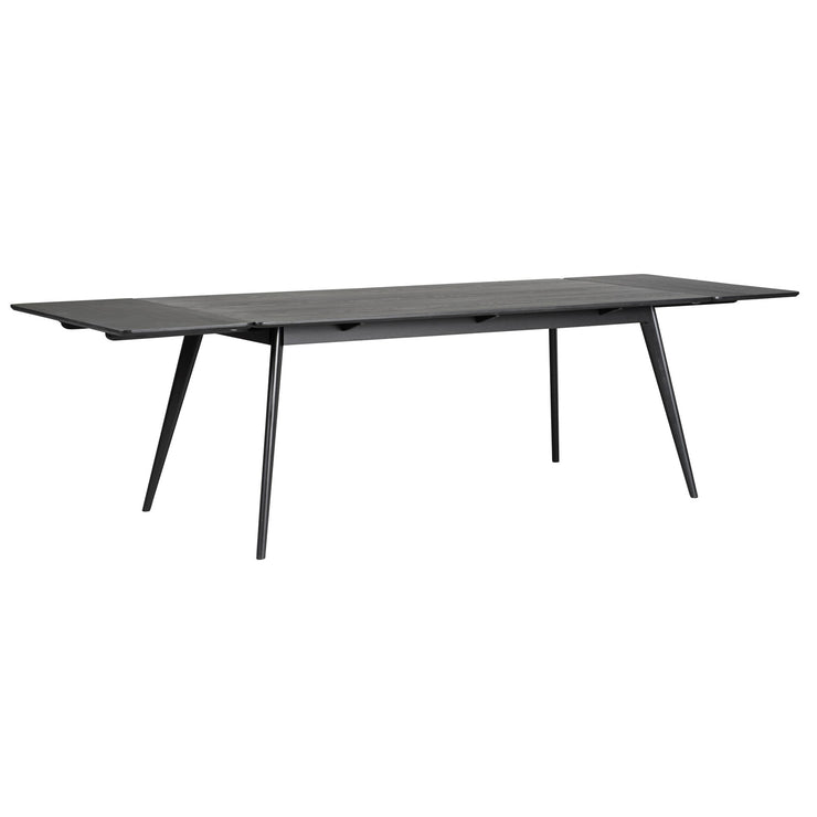 Yumi-pöytä 190 x 90 cm, musta. Kuvassa pöytää on jatkettu jatkopaloilla molemmista päädyistä, jolloin siitä on saatu maksimimittainen 280 cm.