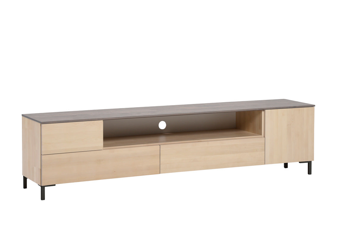 Helsinki-tv-taso harmaalla kannella ja mustilla metallisilla jaloilla, joiden korkeus on 12 cm. Tason pääväri on luonnonvärinen koivu.