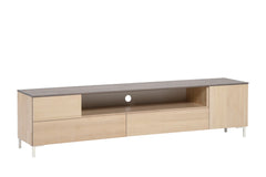 Helsinki-tv-taso harmaalla kannella ja valkoisilla metallisilla jaloilla, joiden korkeus on 12 cm. Tason pääväri on luonnonvärinen koivu.