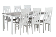 Kaisla/Kanerva 6 hengen ruokailuryhmä valkoharmaalla pöydällä ja valkoharmailla harmailla Kanerva-tuoleilla.