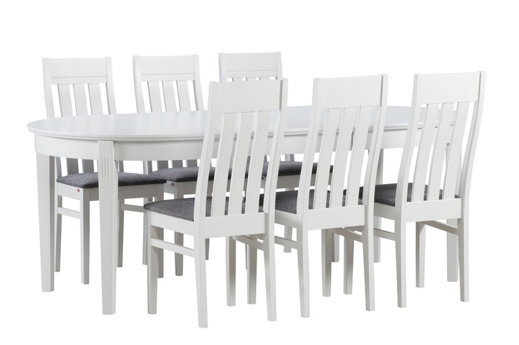 Kanerva-tuolit harmaalla Gusto 94 -kangasverhoilulla ja jatkettava ovaalinmuotoinen Kanerva-pöytä.