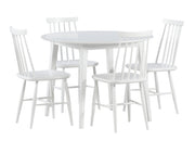 Pyöreä valkoinen 100 cm Laine-ruokapöytä ja valkoiset Ahven-tuolit.