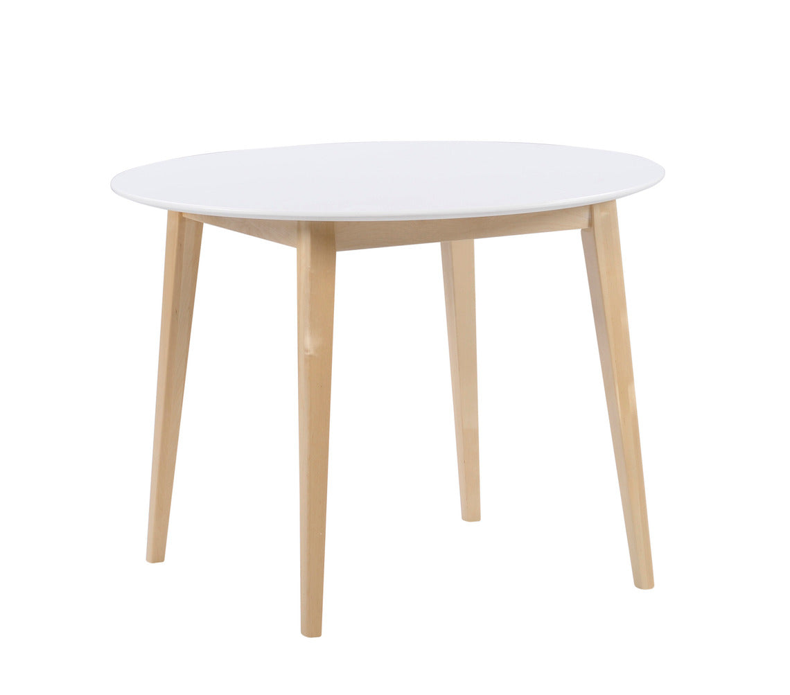 Pyöreä Laine-ruokapöytä valkoisella kannella ja luonnonvärisellä koivurungolla.