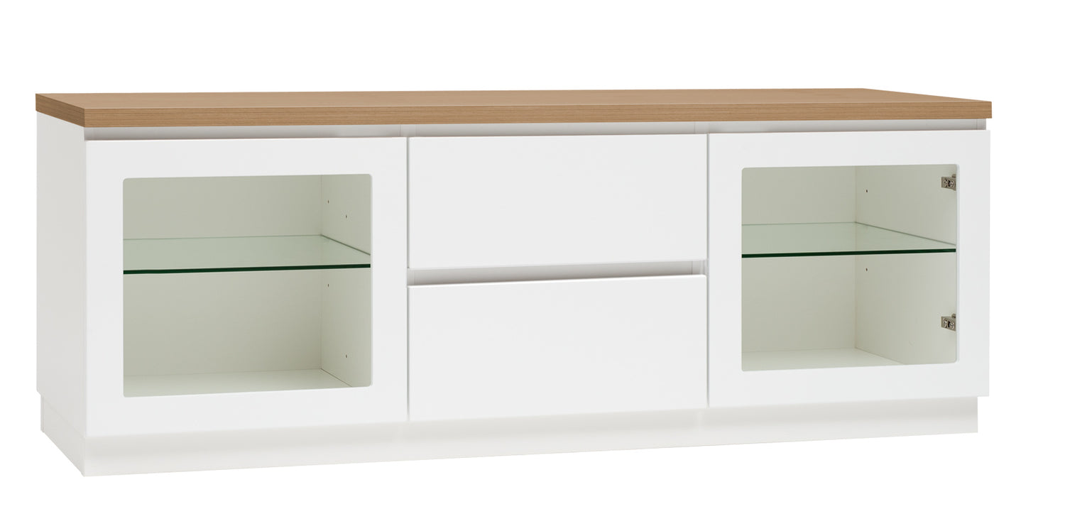 Kuvassa on 137 cm leveä valkoinen Viiva-sarjan tv-taso tammenvärisellä kannella ja valkoisella jalkasokkelilla.