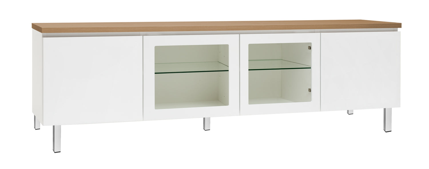 Kuvassa on 184 cm leveä valkoinen Viiva-sarjan tv-taso tammenvärisellä kannella ja valkoisilla metallijaloilla. Kuvasta poiketen tasossa on keskellä yhtenäinen tila ilman väliseinää, 88 cm leveällä lasihyllyllä.