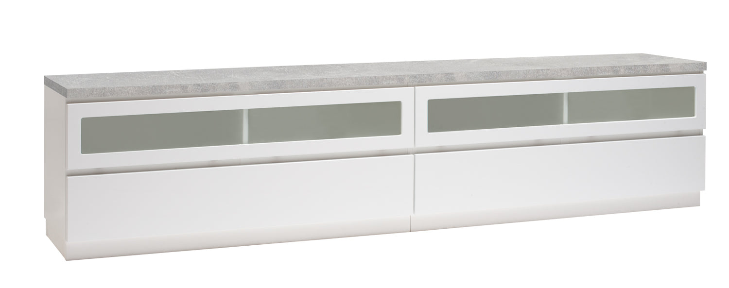 Kuvassa on 220 cm leveä valkoinen Viiva-sarjan tv-taso harmaalla betonijäljitelmän sävyisellä kannella ja valkoisella jalkasokkelilla.