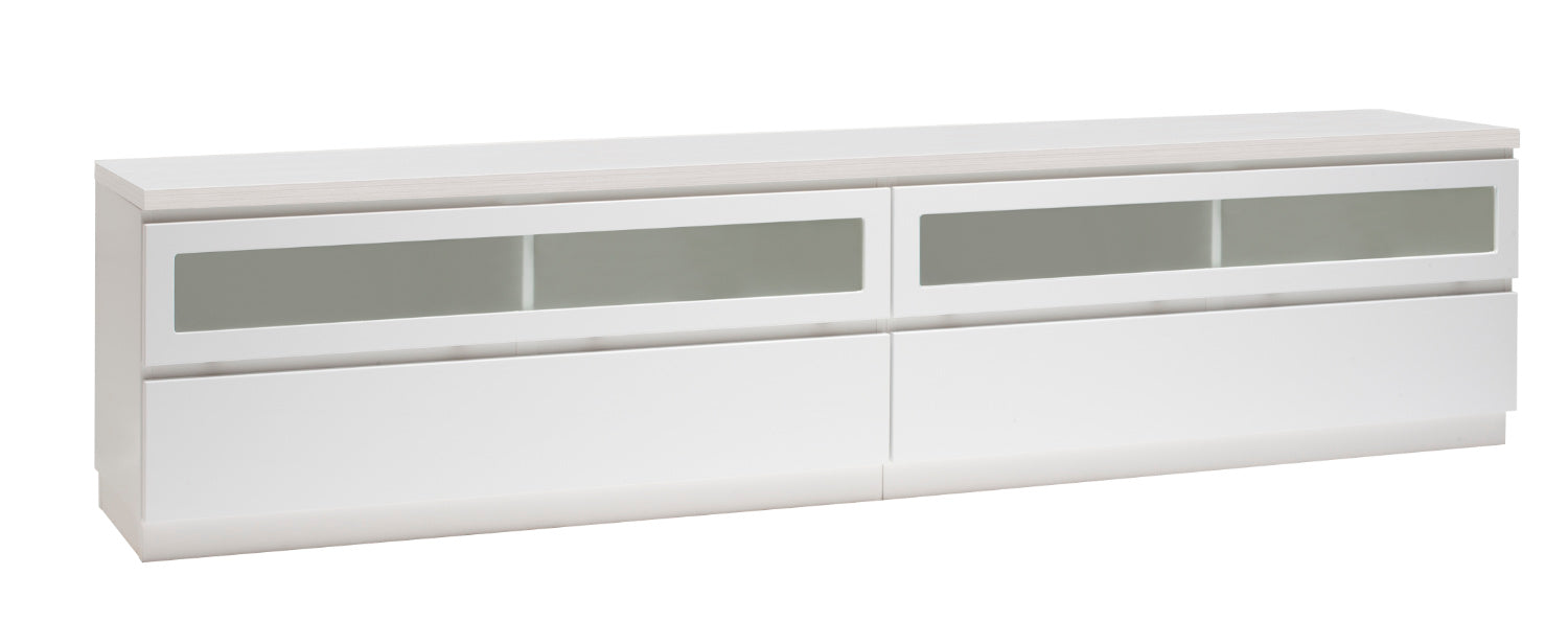 Kuvassa on 220 cm leveä valkoinen Viiva-sarjan tv-taso valkosaarninvärisellä kannella ja valkoisella jalkasokkelilla.