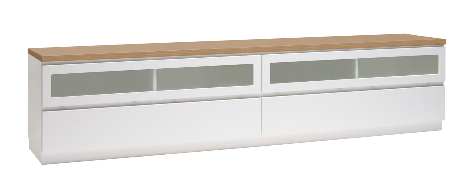 Kuvassa on 220 cm leveä valkoinen Viiva-sarjan tv-taso tammenvärisellä kannella ja valkoisella jalkasokkelilla.